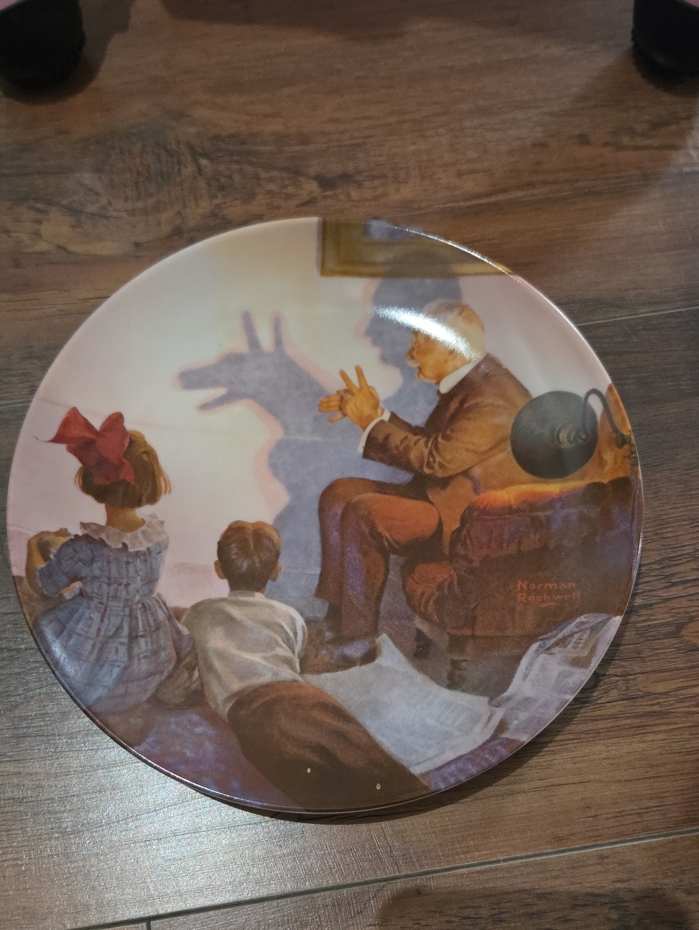 Norman Rockwell Shadow Puppet Family Plate in Brown, Cream, Red, Blue